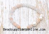 CFB711 faceted rondelle pink aventurine & potato white freshwater pearl stretchy bracelet