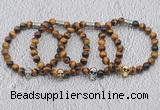 CGB6008 8mm round yellow tiger eye bracelet with skull for men