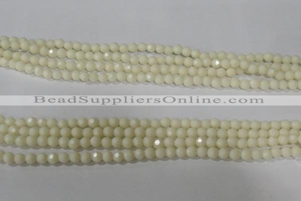 CTU1440 15.5 inches 4mm faceted round synthetic turquoise beads
