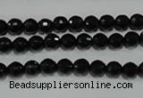 CTU1482 15.5 inches 6mm faceted round synthetic turquoise beads